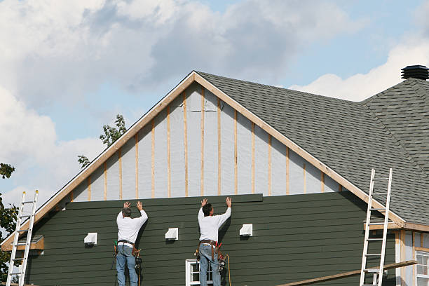 Professional Siding technician working in Harrellsville, NC